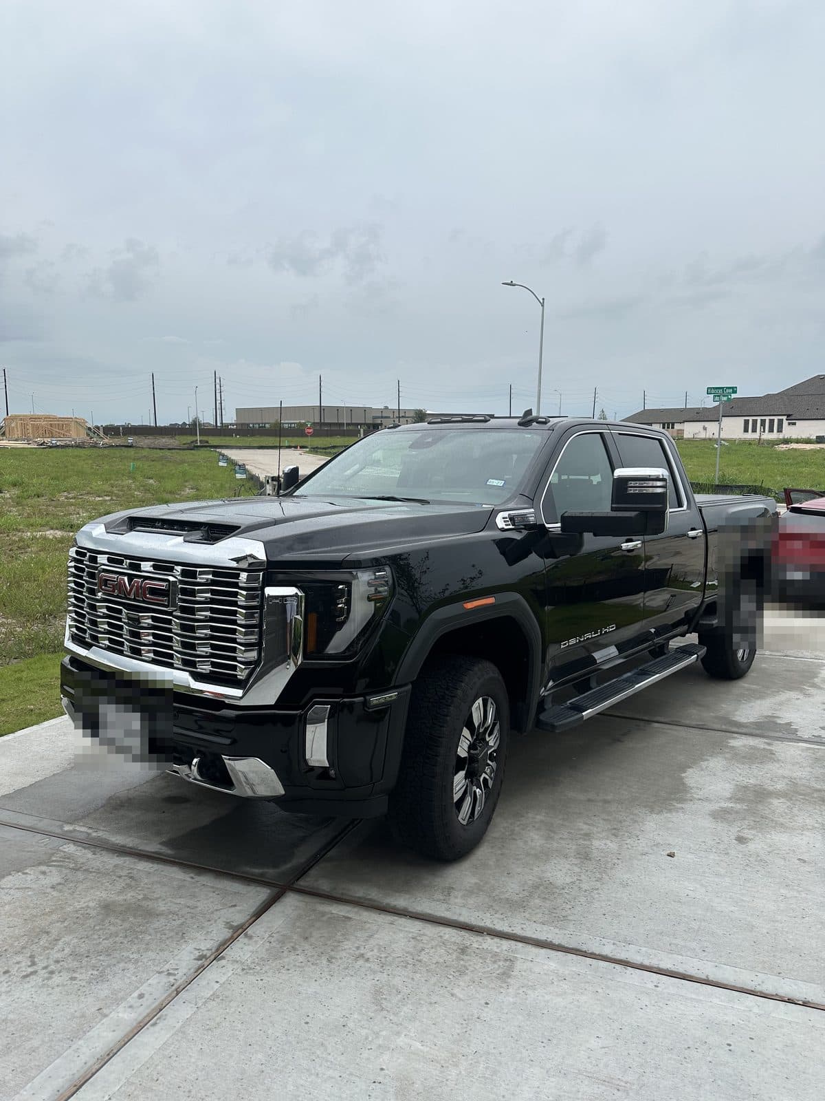 Mobile detailing on a black GMC Sierra Denali HD 2500 in Rosenberg TX | Fresh Path Mobile Detailing